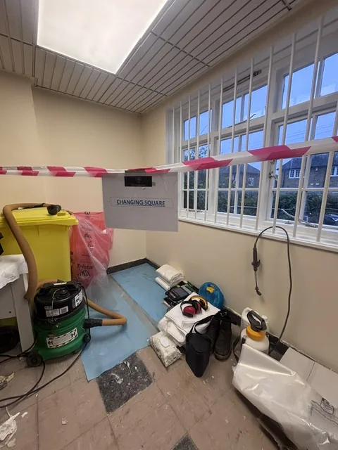 Asbestos floor tile and bitumen removal in Brent Cross